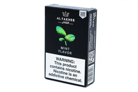 Al Fakher mint flavor, en svart ask med en mintkvist och varningstext om nikotin.