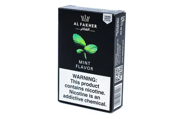 Al Fakher mint flavor, en svart ask med en mintkvist och varningstext om nikotin.